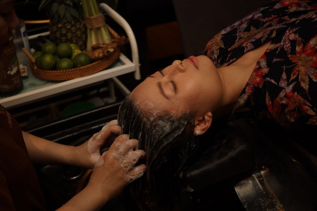 Hair washing with head, neck and shoulder massage